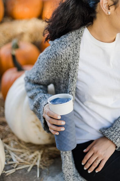 Ello Ogden BPA-Free Ceramic Travel Mug with Lid, Evening Blue, 16 oz | Splash-resistant ceramic travel mug with slider lid and protective silicone sleeve. BPA-free, great for coffee and tea.