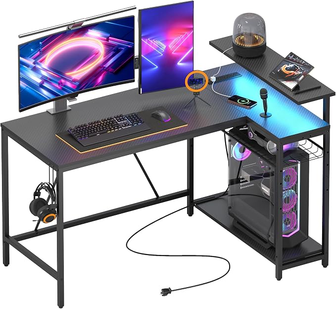 Bestier 52-Inch L-Shaped Gaming Desk with Charging & LED, Black | Charging 3AC+2USB, RGB LED 20 Colors/22 Modes, Reversible Shelves, Carbon Fiber Texture, Headphone Hook, 52 in