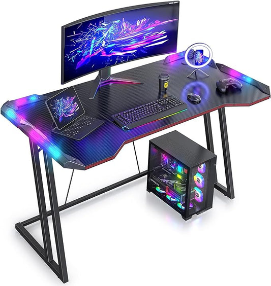 CubiCubi Gaming Desk with LED Lights, 47 Inch Z Shaped Gamer Desk, Home Game Computer Desk with Carbon Fiber Surface, Ergonomic Office PC Workstation with Cable Management, Black