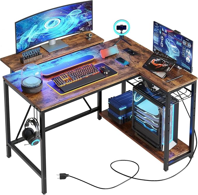 Bestier 42-Inch L-Shaped Gaming Desk with Charging & LED, Rustic Brown | Charging 2AC+USB+Type-C, RGB LED 7 Colors/20 Modes, Reversible Storage Shelves, 3D Carbon Fiber, Headphone Hook, Small Space